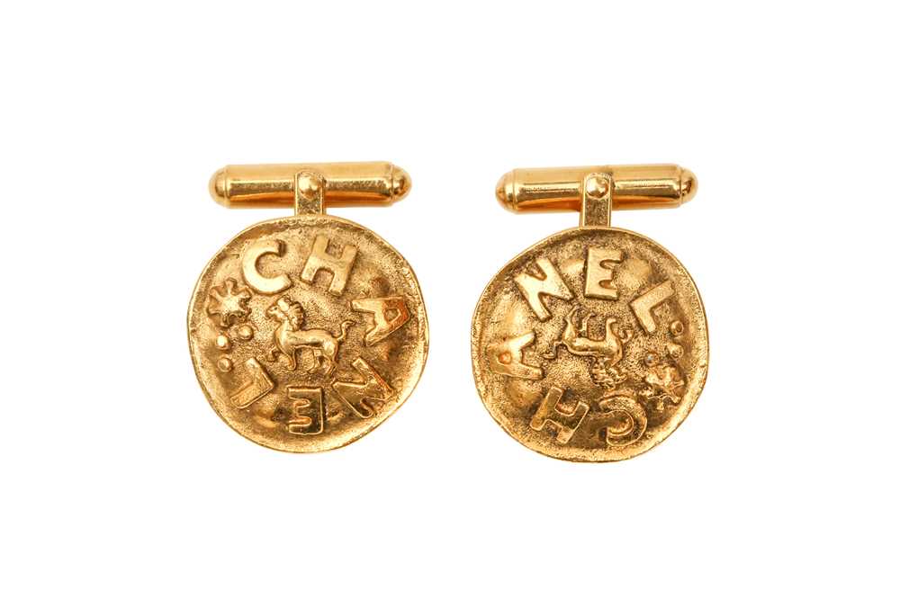 Lot 365 - Chanel Round Lion Relief Cufflinks