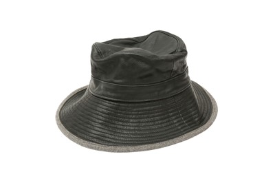 Lot 555 - Hermes Chapeaux Motsch Black Leather Bucket Hat - Size 57