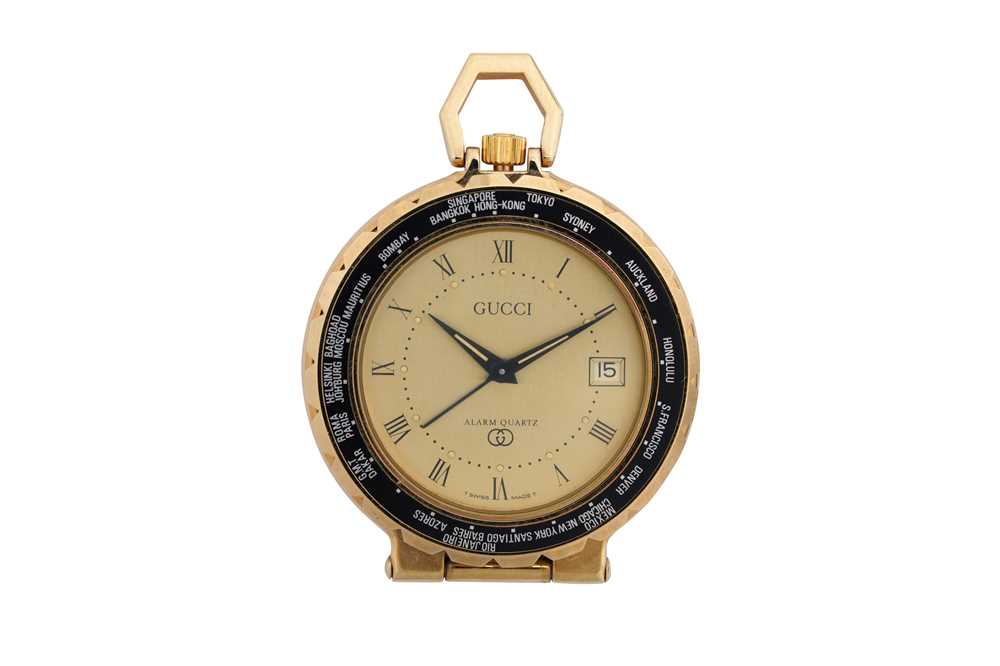 Lot 414 - GUCCI, A TRAVEL ALARM CLOCK