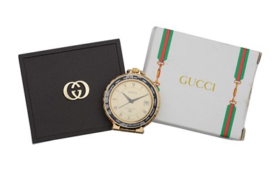 Lot 414 - GUCCI, A TRAVEL ALARM CLOCK