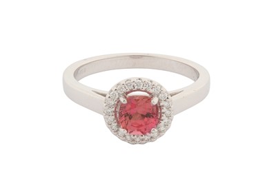 Lot 146 - A PADPARADSCHA AND DIAMOND CLUSTER RING