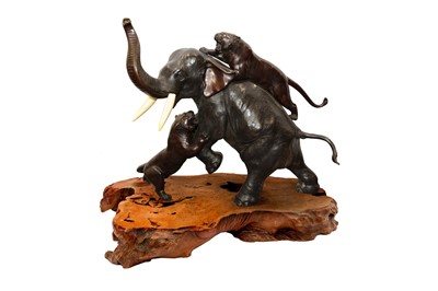 Lot 71 - A JAPANESE PATINATED BRONZE 'ELEPHANT AND TIGERS' GROUP