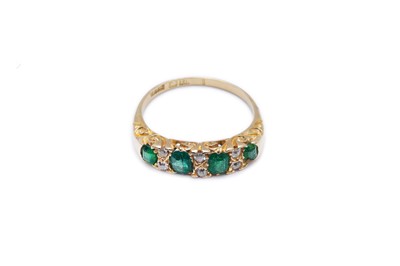 Lot 396 - AN 18CT EMERALD AND DIAMOND RING