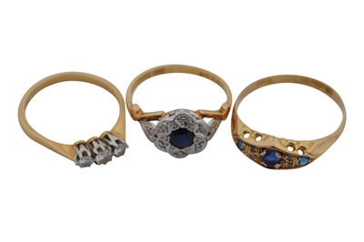 Lot 390 - A GROUP OF THREE DIAMOND RINGS