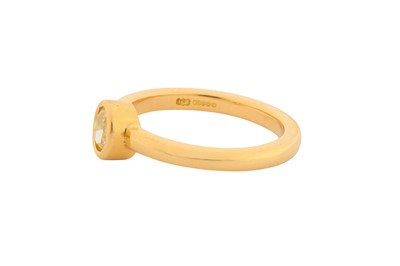 Lot 189 - A FANCY YELLOW DIAMOND SINGLE-STONE RING