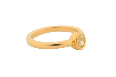 Lot 189 - A FANCY YELLOW DIAMOND SINGLE-STONE RING