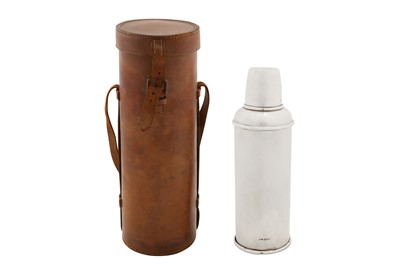 Lot 30 - A George V sterling silver cased thermos flask, Chester 1910 by G & Co