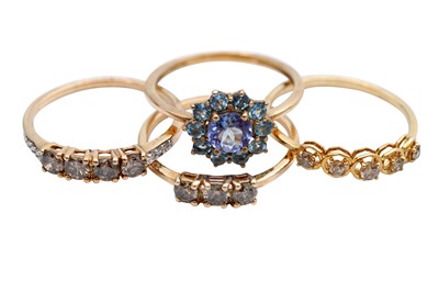 Lot 33 - A GROUP OF FOUR 9CT GOLD GEM-SET RINGS