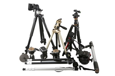 Lot 31 - A selection of tripods.