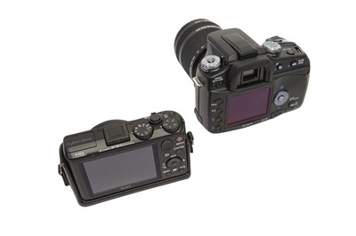 Lot 24 - A Pair Of Sony Digital Cameras.