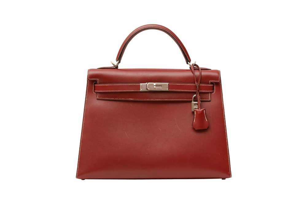 Lot 102 - Hermes Rouge H Swift Kelly Sellier 32