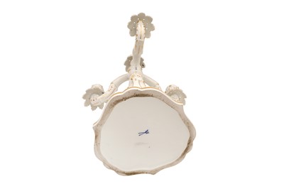 Lot 573 - A PAIR OF MEISSEN PORCELAIN ROCOCO STYLE PARCEL GILT CANDELABRA