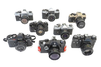 Lot 464 - A selection of SLR cameras and lenses.