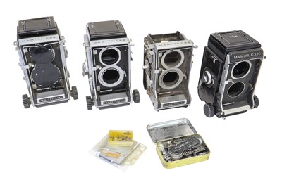 Lot 242 - Four Mamiya TLR bodies for parts.