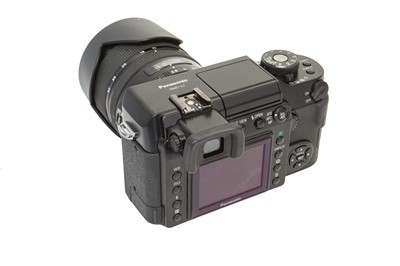Lot 19 - A Boxed Lumix DMC L1K Camera.