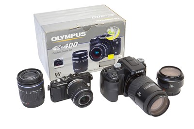 Lot 20 - Olympus & Sony/Minolta Digital Cameras, inc Minolta AF 24mm f2.8 Lens.
