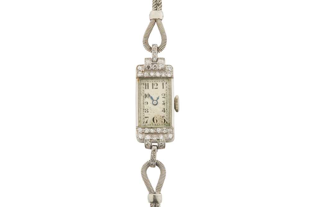 Lot 59 - AN ART DECO DIAMOND COCKTAIL WATCH