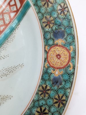 Lot 3 - A CHINESE FAMILLE-VERTE 'LADY AND CHILD' DISH