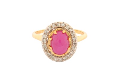 Lot 131 - A STAR RUBY AND DIAMOND RING