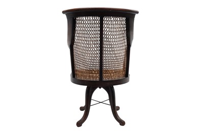 Lot 801 - AN EDWARDIAN STRUNG AND CROSSBANDED CANED MAHOGANY DESK CHAIR