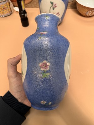 Lot 309 - A PAIR OF CHINESE FAMILLE-ROSE BLUE-GROUND SGRAFFITO VASES