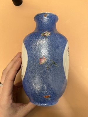Lot 309 - A PAIR OF CHINESE FAMILLE-ROSE BLUE-GROUND SGRAFFITO VASES