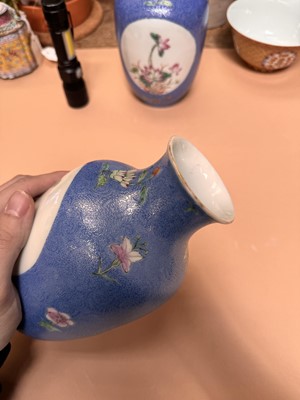Lot 309 - A PAIR OF CHINESE FAMILLE-ROSE BLUE-GROUND SGRAFFITO VASES