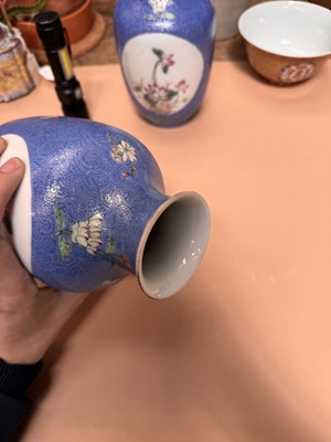 Lot 309 - A PAIR OF CHINESE FAMILLE-ROSE BLUE-GROUND SGRAFFITO VASES
