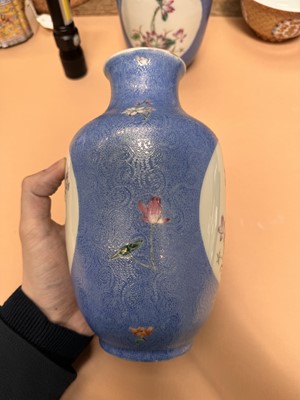 Lot 309 - A PAIR OF CHINESE FAMILLE-ROSE BLUE-GROUND SGRAFFITO VASES