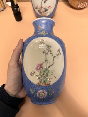 Lot 309 - A PAIR OF CHINESE FAMILLE-ROSE BLUE-GROUND SGRAFFITO VASES