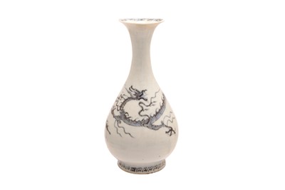 Lot 603 - A CHINESE MING-STYLE BLUE AND WHITE 'DRAGON' VASE