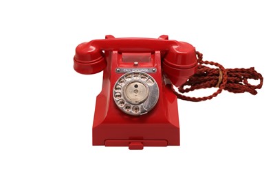 Lot 676 - A 1950S GPO RED BAKELITE 332L TELEPHONE