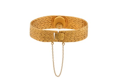 Lot 212 - OMEGA - AN 18K GOLD AND DIAMOND-SET BRACELET WATCH