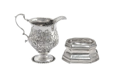 Lot 40 - A GEORGE III STERLING SILVER CREAM JUG, LONDON 1768 BY IS and AN (UNIDENTIFIED)