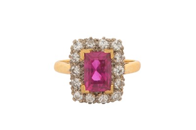 Lot 123 - A RUBY AND DIAMOND CLUSTER RING