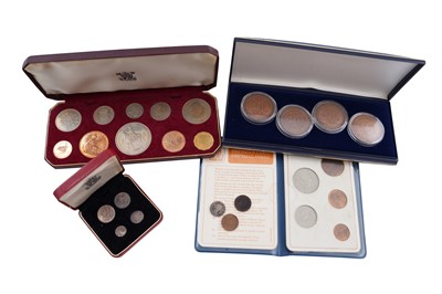 Lot 296 - FOUR SETS OF CASED COINS