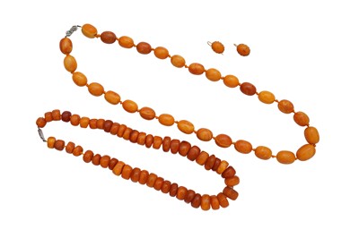 Lot 392 - TWO AMBER NECKLACES AND A PAIR OF AMBER EARRINGS