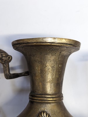 Lot 348 - A TIBETAN BRONZE EWER AND COVER