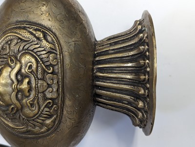 Lot 348 - A TIBETAN BRONZE EWER AND COVER