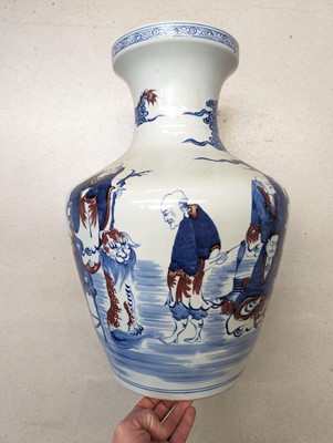 Lot 44 - A LARGE CHINESE BLUE AND WHITE AND COPPER-RED 'IMMORTALS' VASE