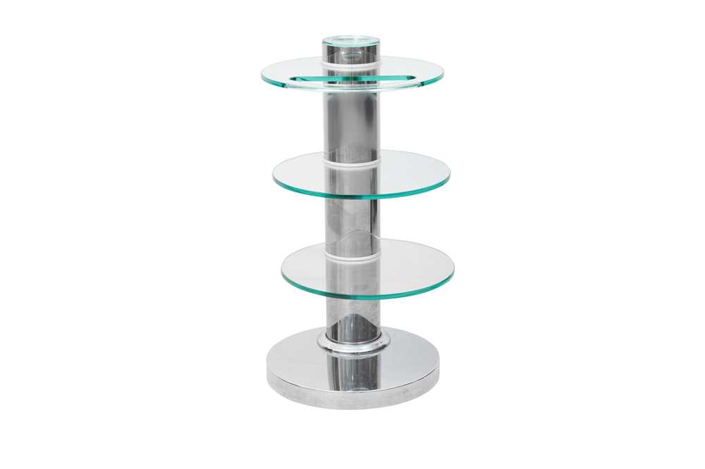 Lot 428 - A GLASS AND CHROME SIDE TABLE