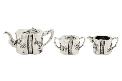 Lot 181 - A late 19th / early 20th century Chinese export silver three-piece tea service, Canton or Shanghai circa 1900 by An Chang, retailed by Hung Chong of Shanghai