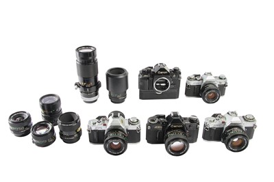 Lot 196 - Five Canon A Series SLR Outfits.