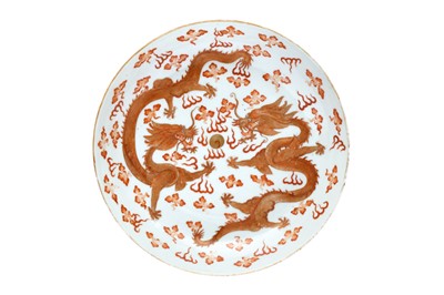 Lot 71 - A CHINESE IRON-RED AND GILT-PAINTED 'DRAGONS' DISH