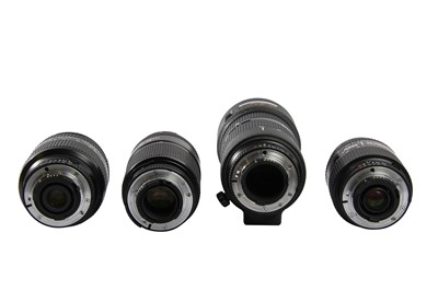 Lot 343 - Four Zoom Nikkor AF Lenses.