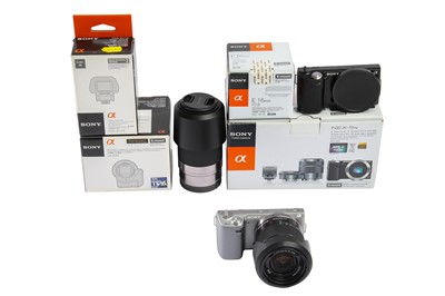 Lot 9 - A Sony NEX 5N Camera & Lenses.
