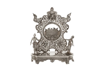 Lot 139 - An unusual late 19th / early 20th century Burmese unmarked silver watch stand holder, Rangoon circa 1900