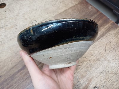Lot 135 - A CHINESE BLACK AND RUSSET-GLAZED BOWL