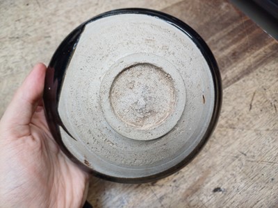 Lot 135 - A CHINESE BLACK AND RUSSET-GLAZED BOWL