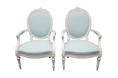 Lot 400 - A PAIR OF FRENCH LOUIS XVI STYLE WHITE PAINTED FAUTEUIL ARMCHAIRS